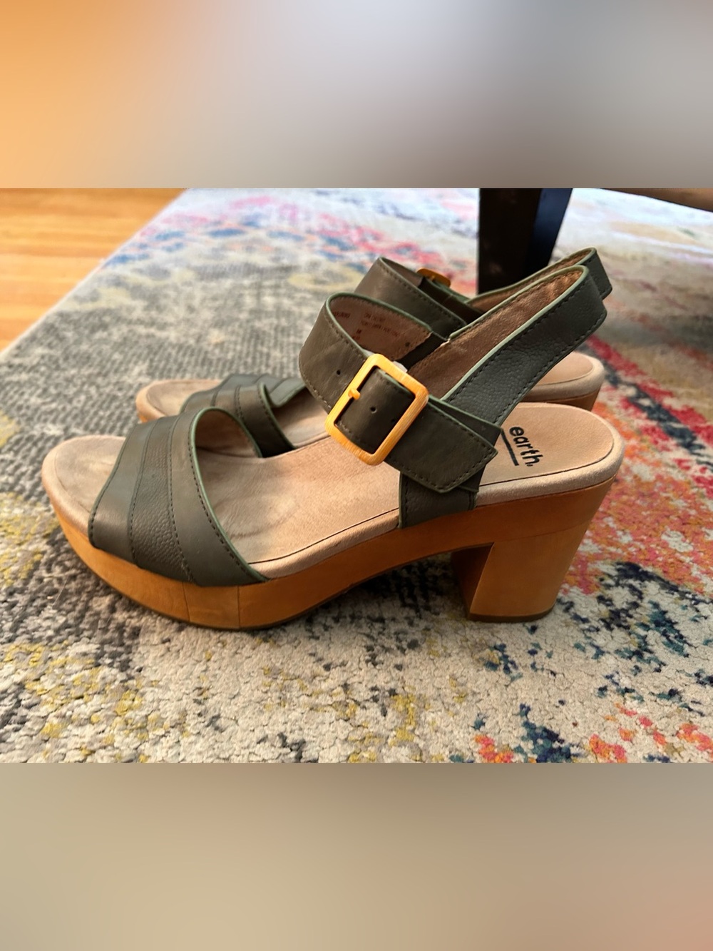 Earth brand comfort platform sandals in forest green with orange buckle
